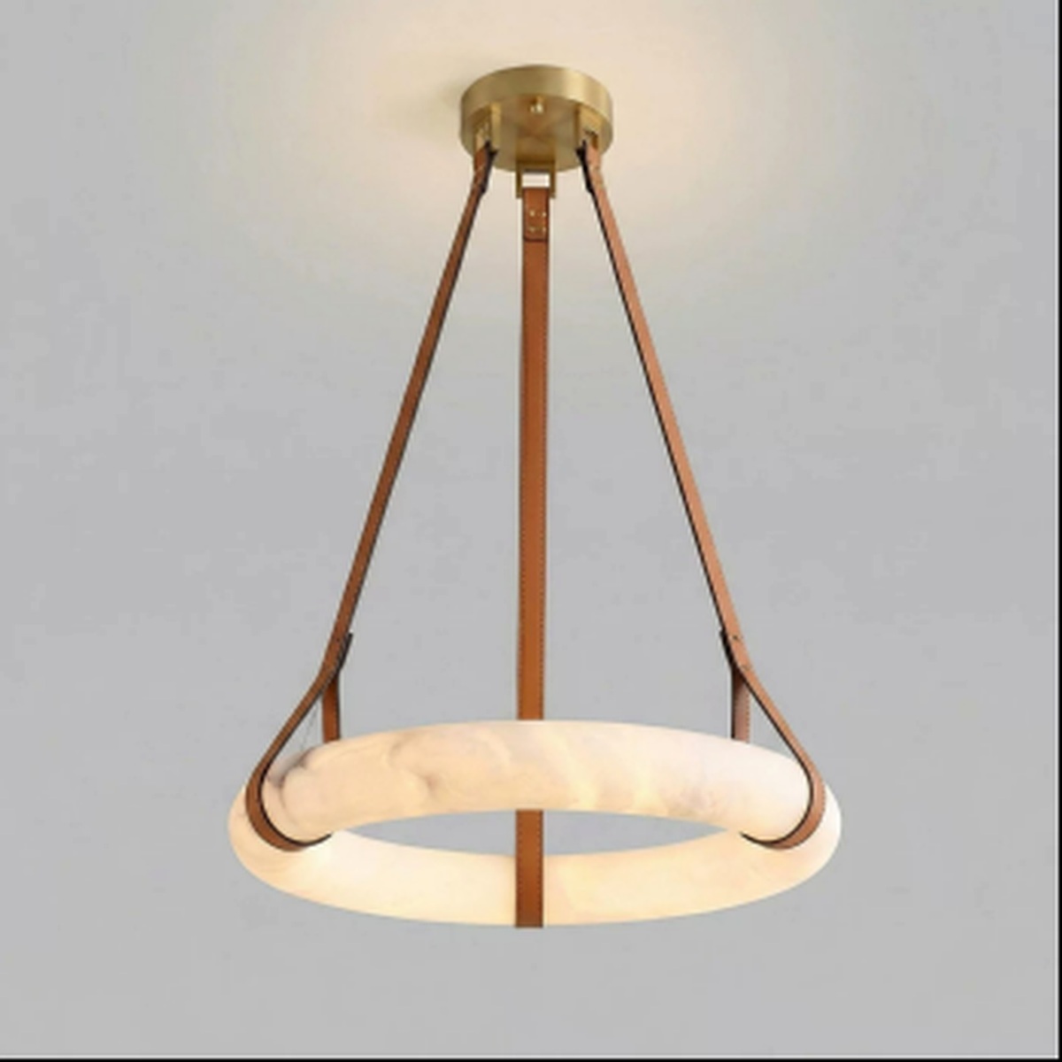 Modern ring-shaped pendant light with a marble-effect finish