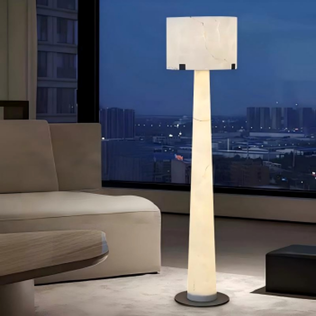 Marble-effect floor lamp with an illuminated stone body in a living room